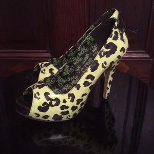 Green leopard heels by iron fist.  US 8